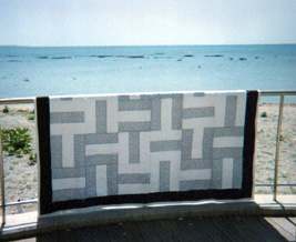 Susan Wright's quilt on the beach at Okinawa 