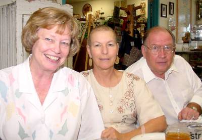 Birthday girl's parents and friend