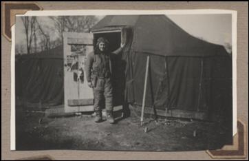 Jack Mercer in front of his tent