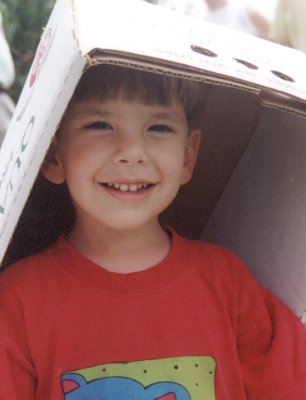 Yovel with a box on his head