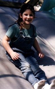 Shira coming down the slide