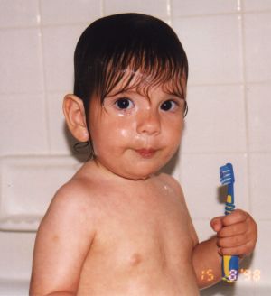 Yovel brushing his teeth in the bath