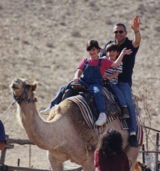 Avi, Shira and Yohai on a camel