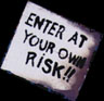 Enter at Own Risk Sign