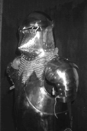 silver suit of armor, view from chest up, with pointed snout-like mask