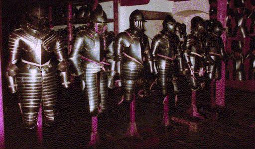 row of knights in bronze armor - full length view