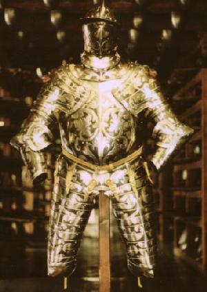 beautiful gold armor - displayed on a post - knees up view