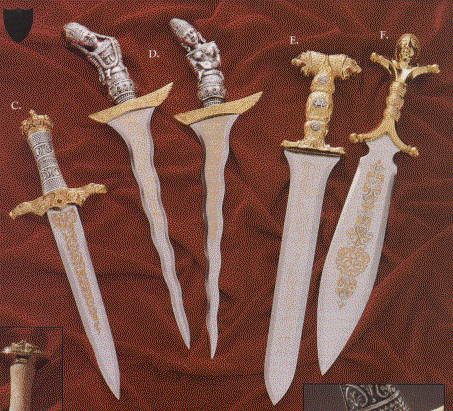 photograph of 5 beautifully carved and embossed daggers.