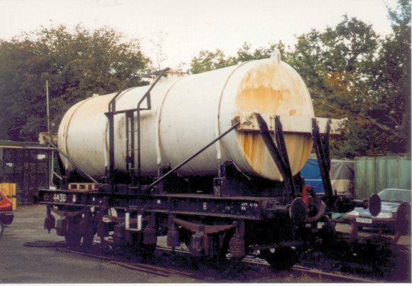 Milk tanker behind carriage sheds at Horsted Keynes