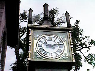 A clock in front of the musicbox house