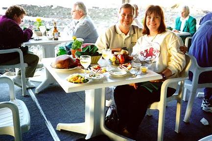 Bruce and Cheryl at a restaurant on their honeymoon