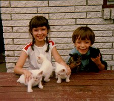 My sister and I with kittens - 1982