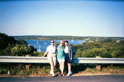 Suze (AKA HwyCruzer) - KathyL - Bev (AKA Stu2dogBev)..posing in front of Menemsha Harbor on the Vineyard