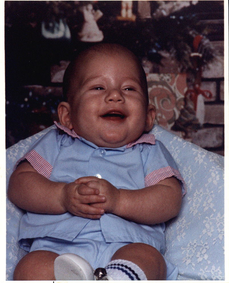 Tyler was 4 months of age, always smiling