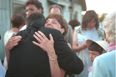 Pat gets a hug from Jane