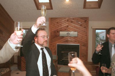 Dan toasting the bridal couple