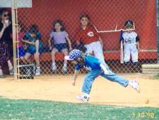 Emma running to first base