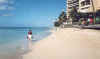 Stacey walking on Waikiki beach