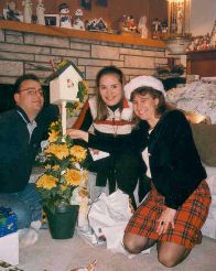 Chris, Janet and me with sunflowers.