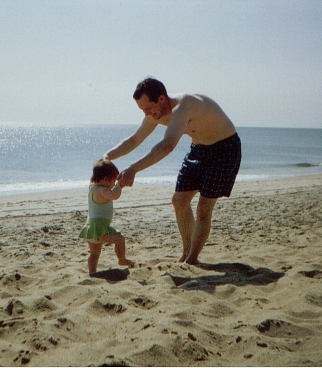 Emily walks on the beach