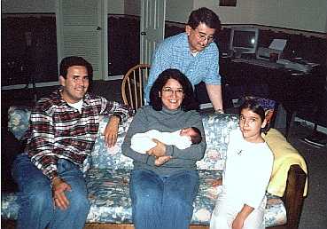 EJ with Abuelito Ortiz, Uncle Brian, Aunt Georginia, Cousin Lexi