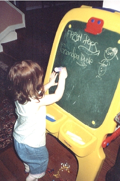 The artist at her chalkboard