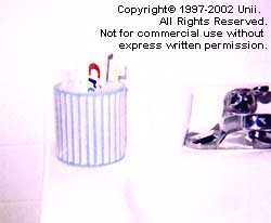 Toothpaste and Toothbrush Holder