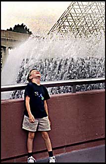 Laughting at a fountain