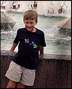 Standing at a fountain