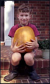 Holding the pumpkin