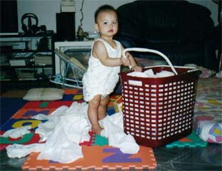 I like to help mommy to clear the laundry basket...