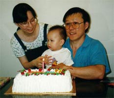 Adriel, daddy, mommy and the BIG cake