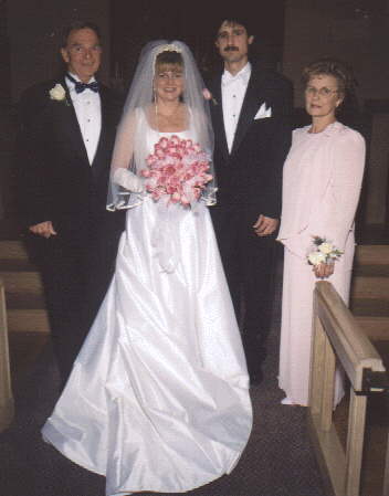 Diane and Scott pose with Diane's Parents.