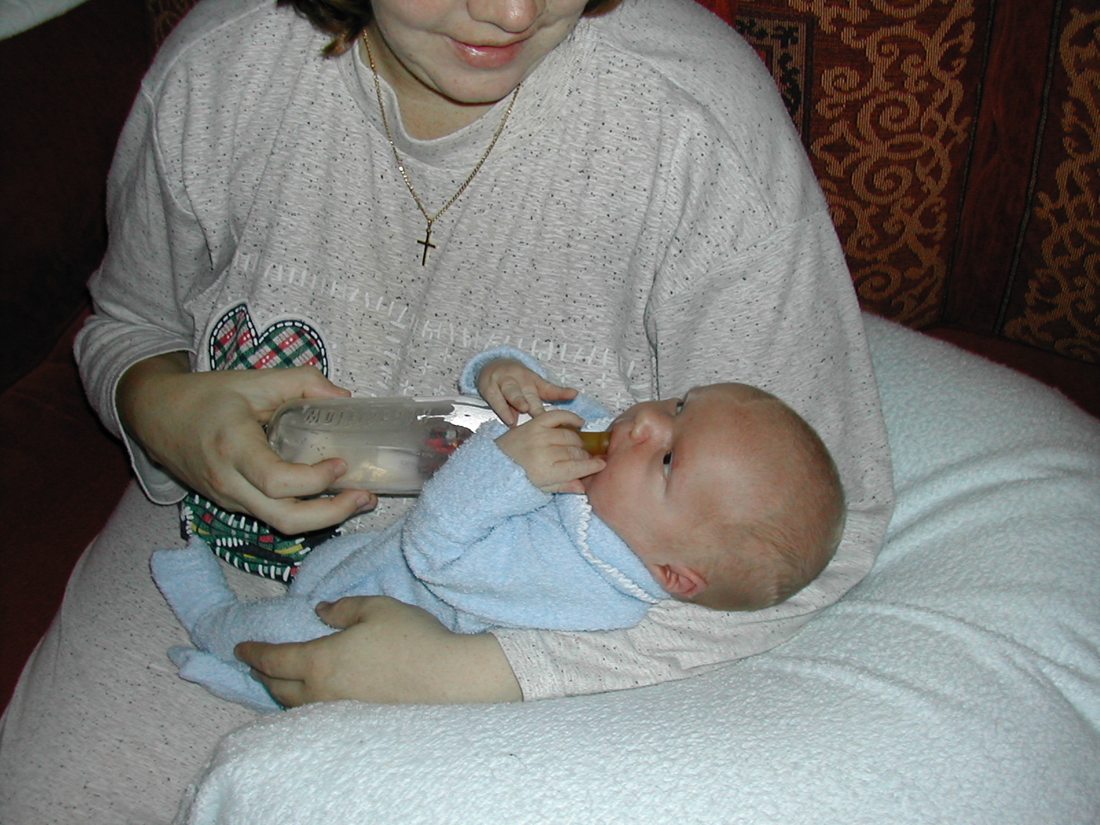 Cameron being bottle fed by Carolyn