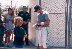 Keanu signing a Premiere magazine for Sandy's daughter Mary