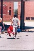 Keanu carrying some football equipment