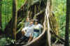 Me, mum and Nicola in the buttress roots of a tree