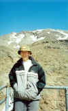 Me with the snow-covered peak behind me