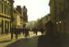 In the morning, a cobbled walking street in central Gyr, with Lacsi Baci in the foreground