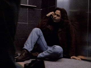 Blair in elevator (Dead Drop)