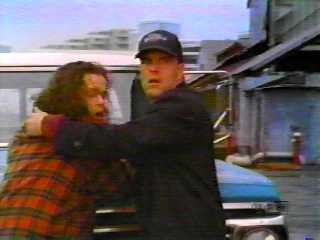 Jim protecting Blair from the car explosion (Neighborhood Watch)