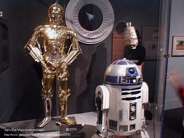 Life sized R2-D2 and C-3P0 droids, standing ready for inspection.