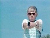 Thelma pointing revolver