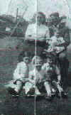 as a child, with his family