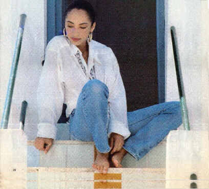 Sade sitting on steps