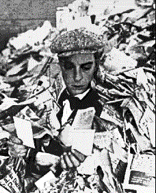 Buster in 'The Cameraman', under a pile of letters.