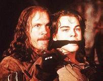 Leo (as the evil King Louis) with John Malkovich as one of the musketeers