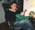 Brian opening a belated b-day gift (Oct 2004)