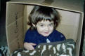 Johannes in his fort, wrapped in my tiger blanket (March 2005)