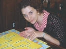 Jessica T spells "orgy" on the Scrabble Jr board (Aug 2004)